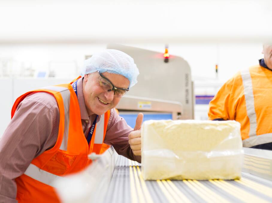 Stanhope cheese plant's Neil Bickerstaff with the first cheese production run at the re-built Fonterra plant in northern Victoria.
