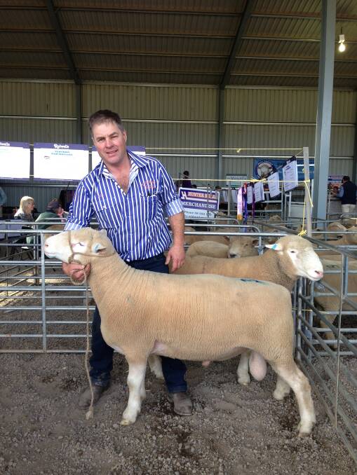 Rob McCartney, Yentrac sheep studs, with the top-priced ram. Photo supplied by Shelby Howard, Rodwells Shepparton.
