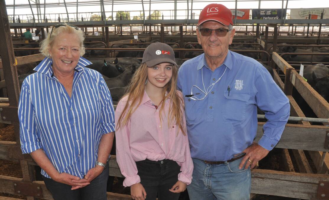 Moonee Hills manager Deb Macdonald, Meningie and owner John Tilley with granddaughter Lily Bowling watched their 145 PTIC heifers top at $2220 and average $1980.