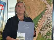 WoolProducers Australia chief executive officer Jo Hall with the updated Trust in Australian Wool brochure. Picture by Catherine Miller