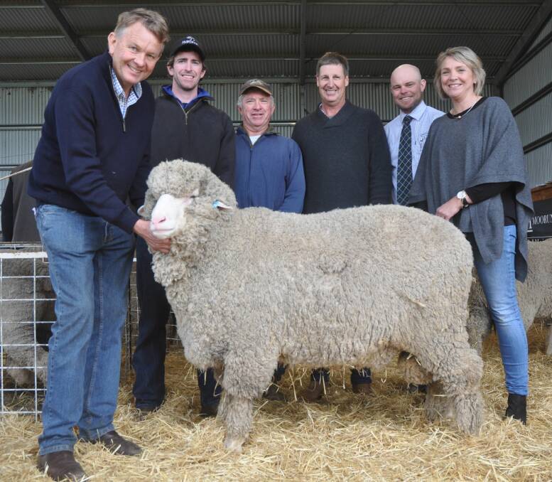 GENETIC BOOST: Moorundie's Geoff and Bernadette Davidson with Benji and Bevin Bury, Jaburee stud, Wilmington who bought the $18,000 top priced ram with Paul Cousins, Burra and Spence Dix & Co auctioneer Luke Schreiber.
