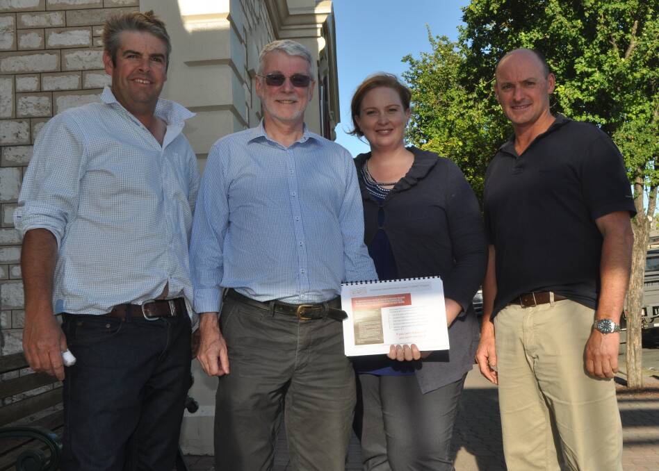 DATA ANALYSIS: Limestone Coast Red Meat Cluster's Will Malone, Ann Aldersey and chair Peter Stock discuss the report with Dennis Wignall.