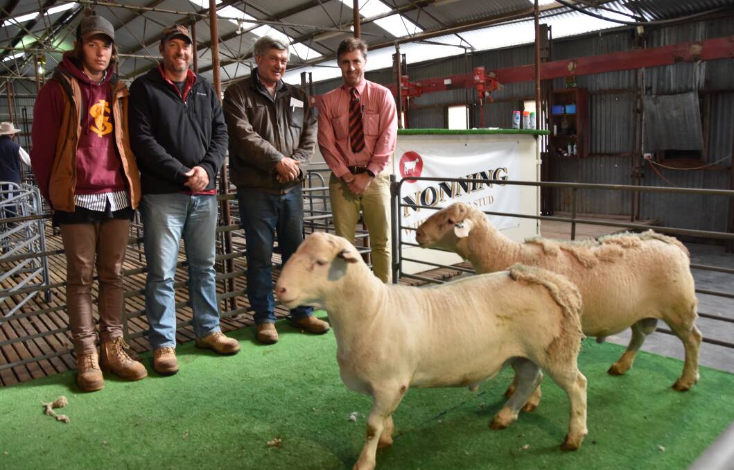Blaine and Jared Burke, Bargunyah Pastoral, via Ivanhoe, NSW, paid the $1500 top price at Nonning White Dorper ram sale. They are with Nonning's Angus McTaggart and Elders Naracoorte branch manager Tom Dennis.