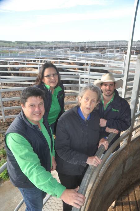 TICK OF APPROVAL Iranda Beef's managing director Paul Vogt and staff Erika Materne and Tom Green show Temple Grandin their feedlot yards.