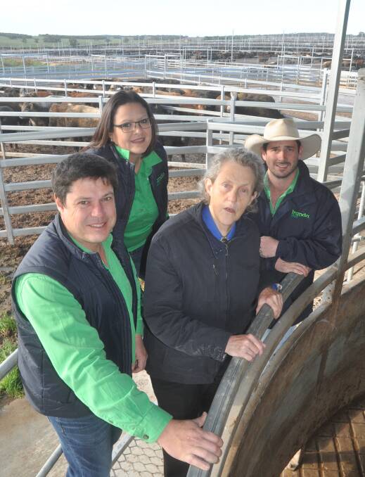 TICK OF APPROVAL: Iranda Beef managing director Paul Vogt and staff Erika Materne and Tom Green showing Temple Grandin their feedlot yards.