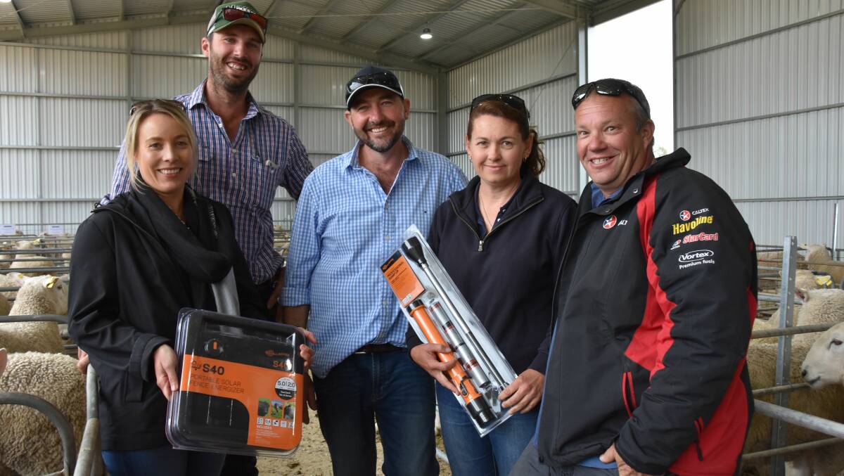 LUCKY PRIZES: The winners of the Gallagher lucky lot prizes were Susie Pocock and Angus Munro, Pocock Pastoral, Lameroo and Western Flat, and Danielle and Brentyn Francis, Western Flat. They are with Paxton stud principal Martin Harvey (third from left).
