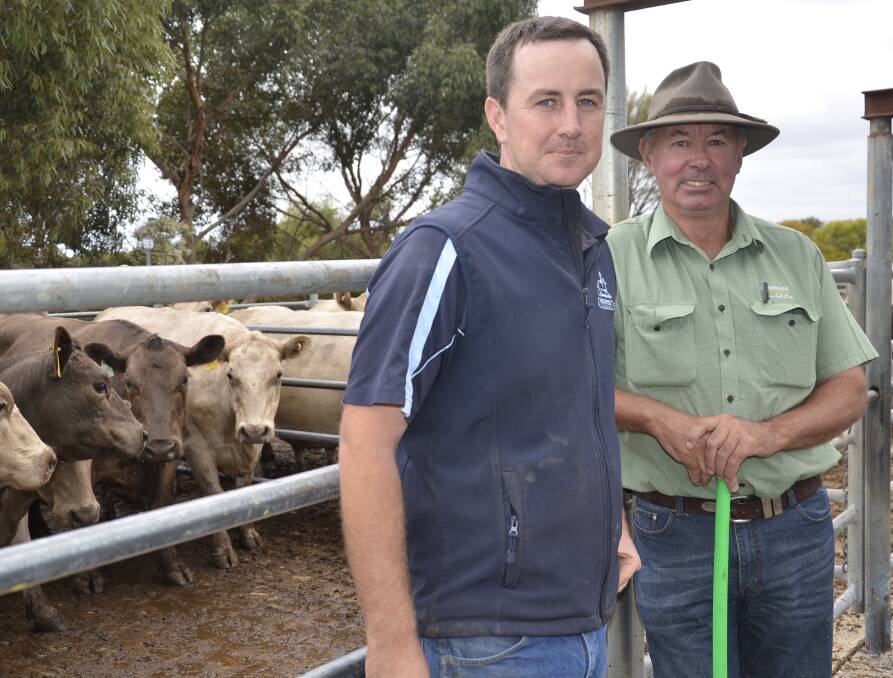 JUST REWARDS: ProStock agent Clinton Endersby with Landmark Harcourts Strathalbyn agent Richard Snoswell, who said high beef prices were long overdue and producers needed $1000 a head for weaners to remain viable.