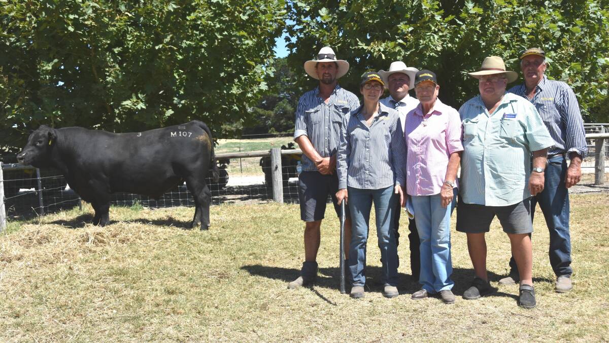 Granite Ridge stud's Alistair Watson, Pat Ebert and Colin Flanagan (right) with auctioneer Michael Glasser, GTSM, and Coralee and Allan Gillogly, NSW, who bought the $26,000 sale topper.