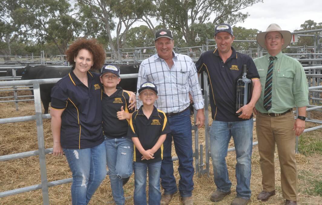 STUD TOP: Buyers Karen, Mitchell, Lacey and Regan Burow (second from right), Yerwal Estate, Lucindale, with Sterita Park's Nanni DiGiorgio and Landmark's Gordon Wood.