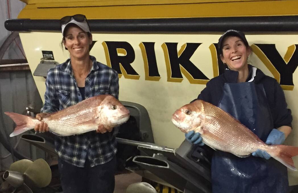 CROWD-PLEASERS: Gill Fisheries' Shannon Gill and Amanda Wheeler with fresh snapper caught on Friday - the second day of the new season.