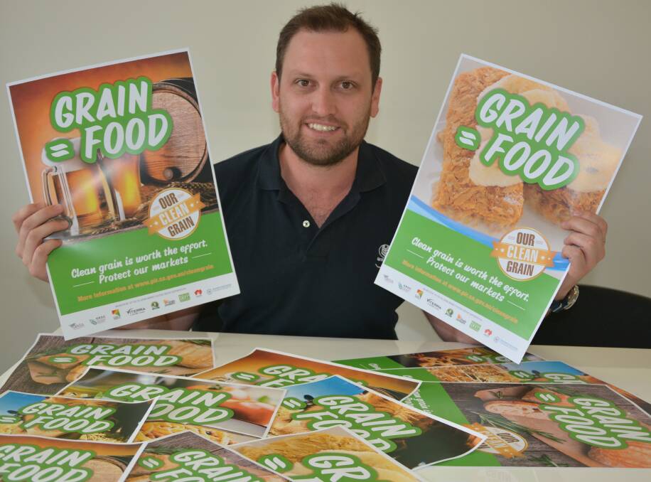 GRAIN HYGIENE: Grain Industry Association of SA chair Lachlan Allen with posters which will be displayed at bulk handler facilities and other relevant sites.