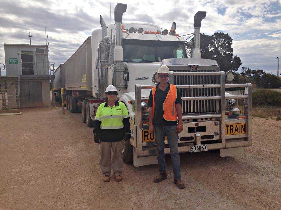 Viterra employee Wendy Every taking the first EP delivery of the 2017-18 harvest from carrier Shane Trowbridge. The grain was produced by Andrew Mahar at Koonibba.