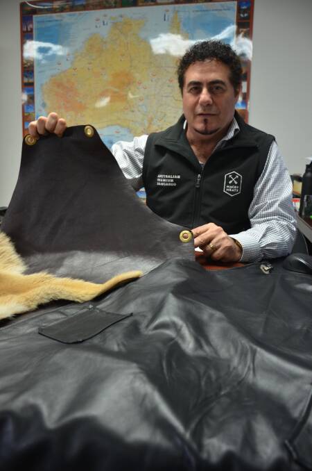 NEW FOCUS: Macro Meats founder Ray Borda with some of the kangaroo leather chef's aprons he plans to start selling online this year.