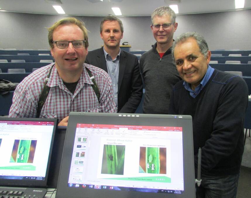 GRDC Grower Services southern manager Craig Ruchs (second from left), at a Russian wheat aphid information session at Roseworthy with SARDI entomologists Michael Nash, Greg Baker and Latif Salehi.