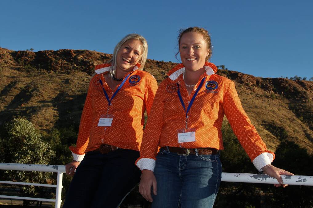Equality: Alice Springs ICPA members Sarah Cook and Amber Driver are among many geographically isolated families paying boarding school equivalent fees to educate children through the public distance education system, an issue raised at the federal conference. Picture: Sally Cripps.