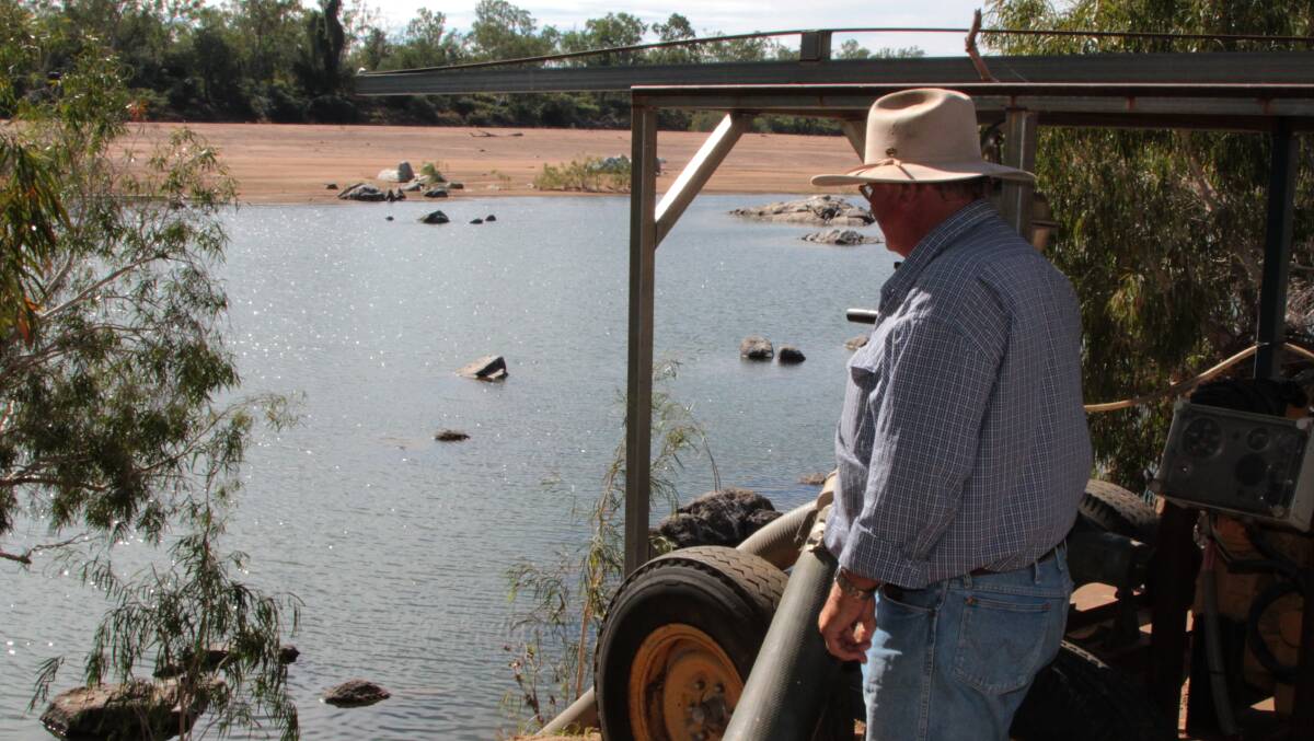 Primary producers, such as Charters Towers cattleman Colin Ferguson, pictured with his pump on the Burdekin River, traded scenarios with conservation groups when they appeared before the Parliamentary committee in Townsville.