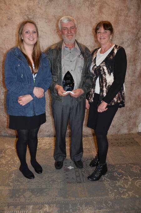 MASTER OF INDUSTRY: Grant Liebelt (centre), Grantley Holsteins, Paris Creek, at the time of his Master Breeder award, with Bridget Liebelt and Bronwyn Johnson.