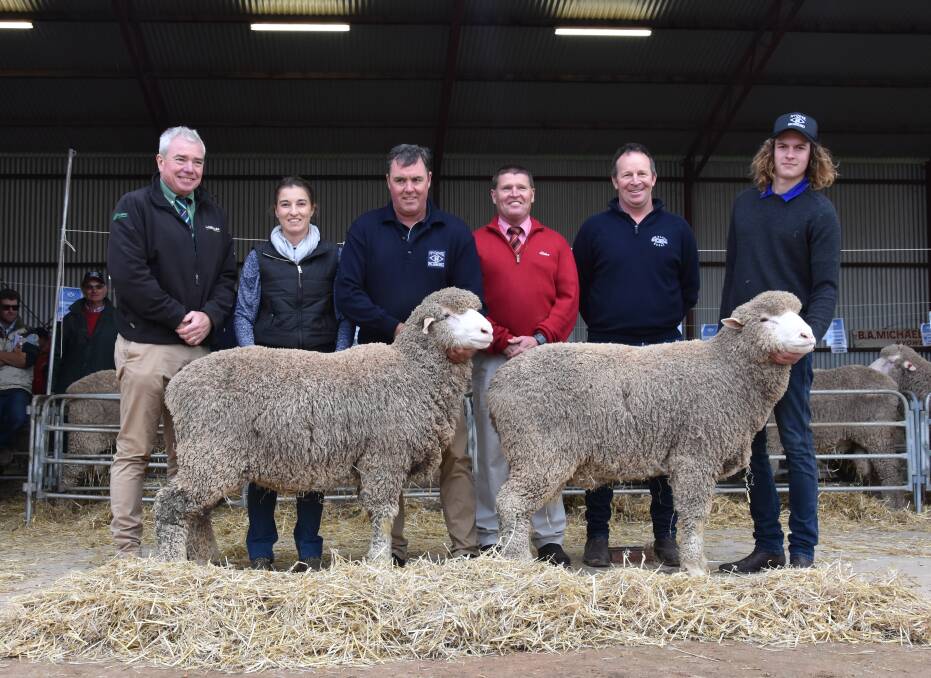 STUD SIRES: Landmark stud stock's Leo Redden, Nyowee's Laura Michael and Ian Michael, Elders stud stock's Tony Wetherall, Fox & Lillie's Andrew Hendy, Horsham, Vic, and Jake Michael, with the $14,000 and $10,000 rams at the Nyowee on-property sale.