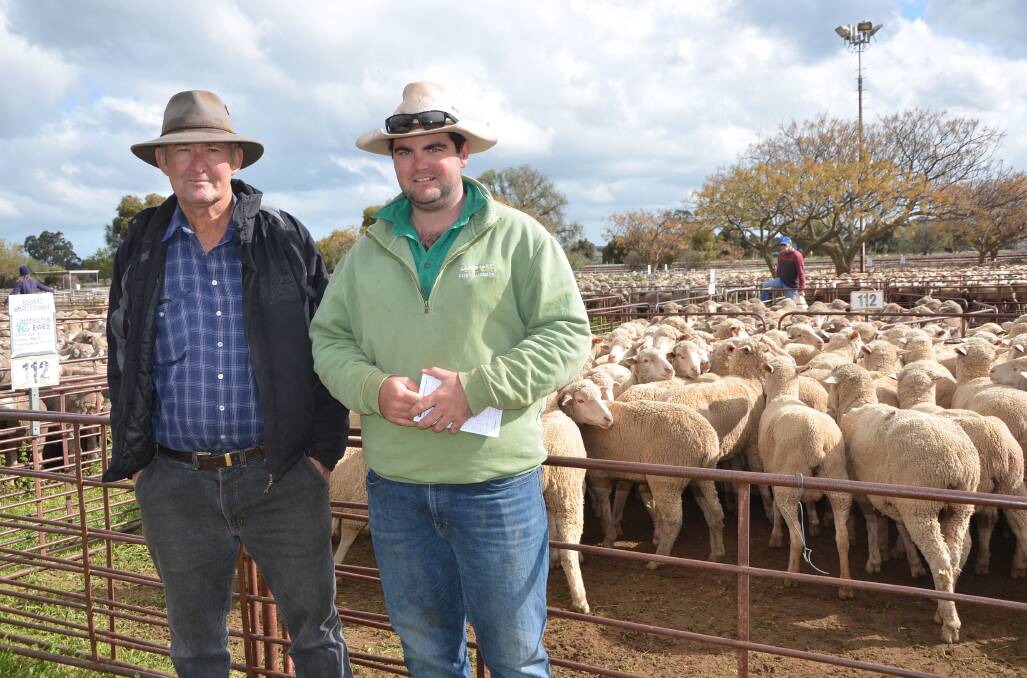 SELL OFF: Peter Litchfield, Mundowdna Station, Marree, with Landmark Port Augusta agent Alex Buckingham. Mr Litchfield sold about eight decks of sheep as he is moving from Merinos to Dorpers and Australian Whites. 