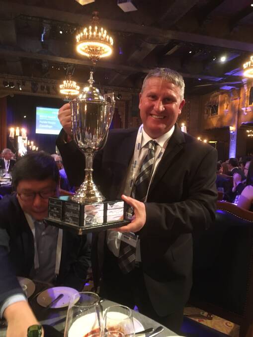 TROPHY PRODUCE: Beston’s master cheesemaker Paul Connolly with the Christian Hansen Cup for best cheddar in Australia at the Dairy Industry Association of Australia awards presentation.
