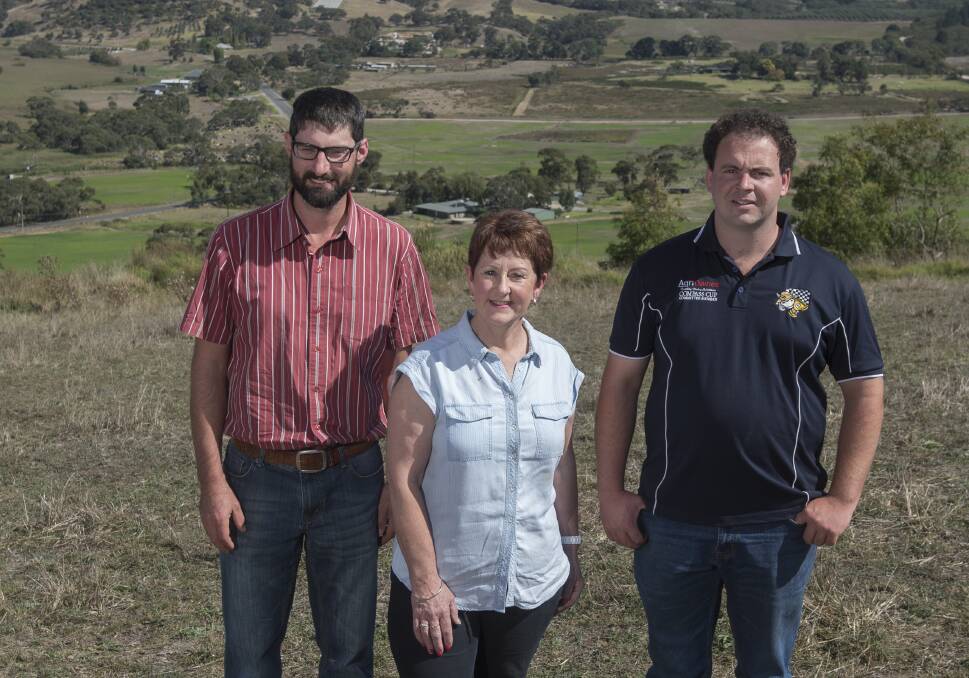 HELPING HANDS: Jervois dairyfarmer Michele Golder (centre) with fellow young dairyfarmers Jason Steinborne, Hope Forest, and Jake Connor, Mount Compass. 