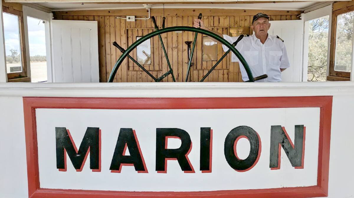 STEERING DUTIES: Mannum Dock Museum chair Rob Bowring at the wheel of the PS Marion, heading to the Wentworth, NSW, celebrations.