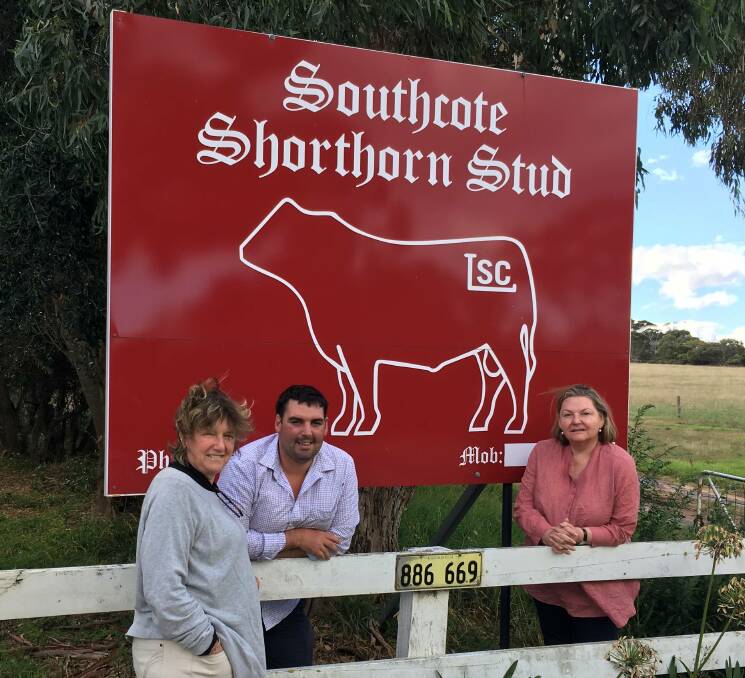 CHANGING HANDS: Sam Martin (centre), Walcha, NSW, is congratulated by Southcote stud's Fiona Roche and Deborah Hamilton on buying the Southcote herd and prefix. 