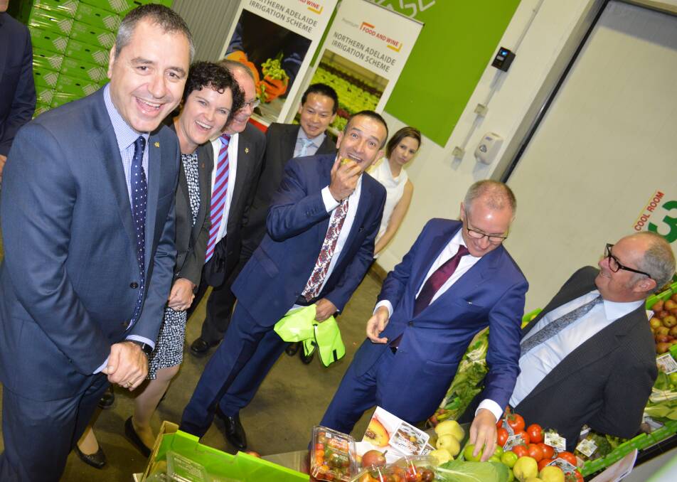 FRESH FACELIFT: SA Produce Market chief executive Angelo Demasi, Horticulture Coalition president Susie Green, Water Minister Ian Hunter, Tung Ngo MLC, Member for Light Tony Piccolo, Premier Jay Weatherill and Agriculture, Food and Fisheries Minister Leon Bignell.