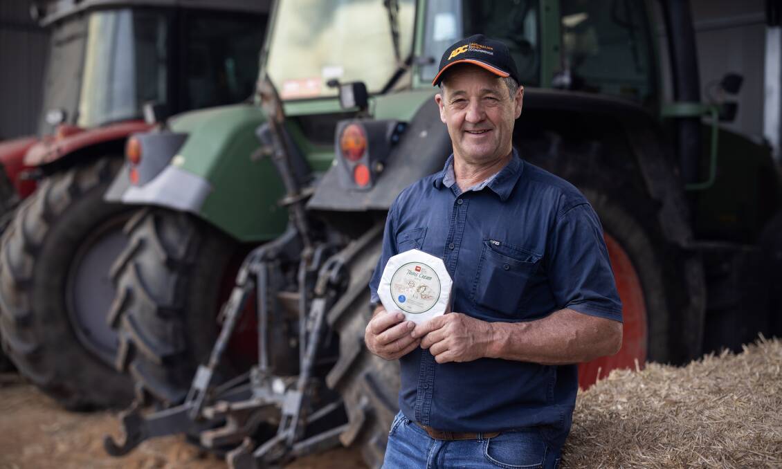 Udder Delights dairyfarmer supplier Rick Gladigau, Mount Torrens, with the new range of Double Cream Brie, which is helping support farmer mental health and wellbeing. Picture supplied