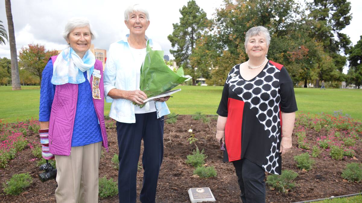 DEEP ROOTS: WAB stalwarts Thelma Newman, Strathalbyn, Barbara Schaefer AM, Kimba, and state president Elizabeth Calvert, Manoora, with the rose.