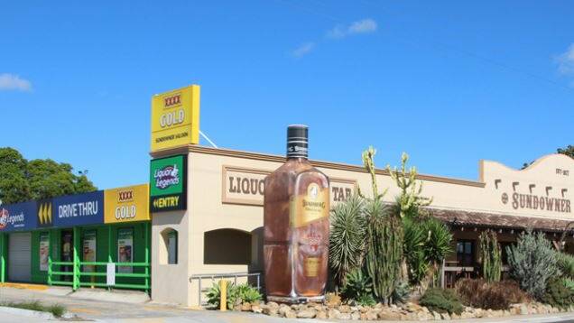 The Sundowner Hotel, home of one of Queensland's two ''big Bundy'' bottles, is for sale. Photo: Supplied