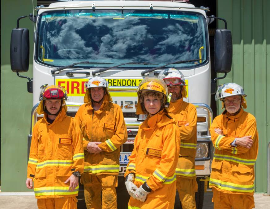 Clarendon SA Country Fire Service volunteers (from left) James Colbert, Brian Laidler, captain Sue Leslie (front) Colin Leslie and Chris Price, in front of their new firefighting truck.