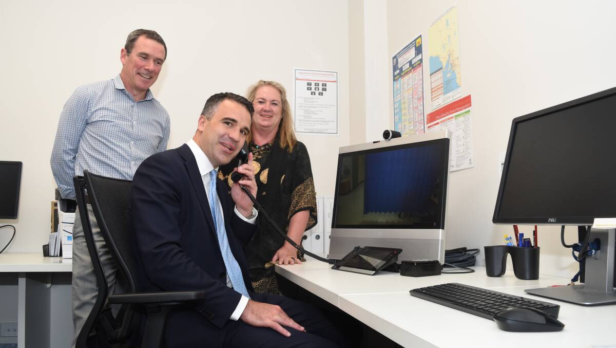 GP SUPPORT: Doctor Tim Kelly and Country Health SA's Maree Geraghty show Health Minister Peter Malinauskas the SAVES system.