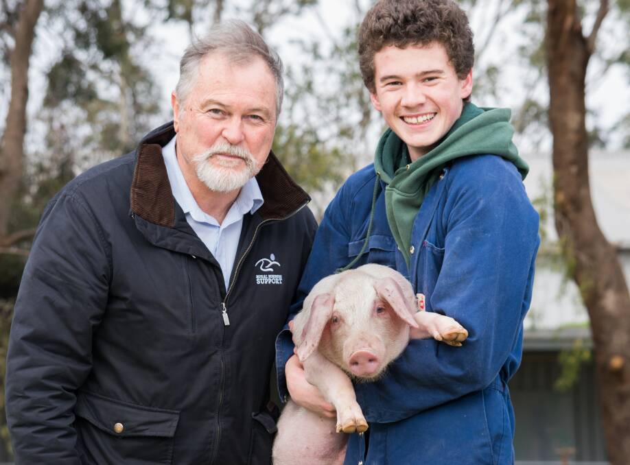NEW PLAN: RBS' Nigel Robinson recently launched the pork business review at Mannum. He is pictured with Urrbrae Agricultural High School student Max Winnen.