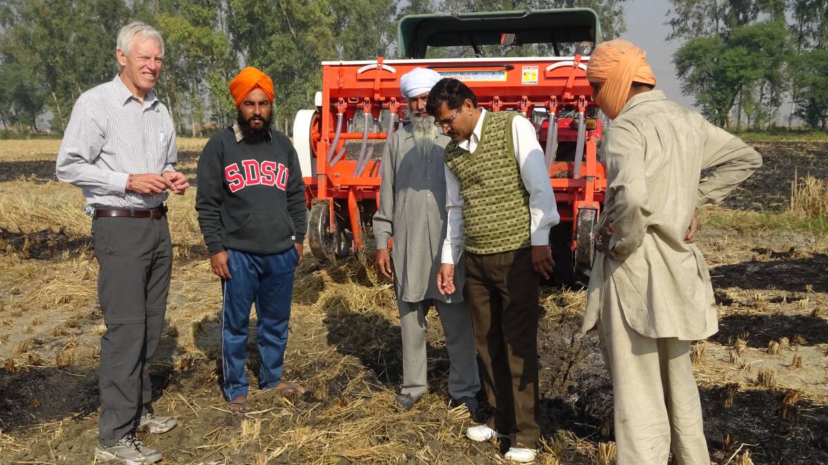 Second generation seed drill designed for sowing wheat into retained rice stubbles, Kaithal district, Haryana State, India, November 2014.