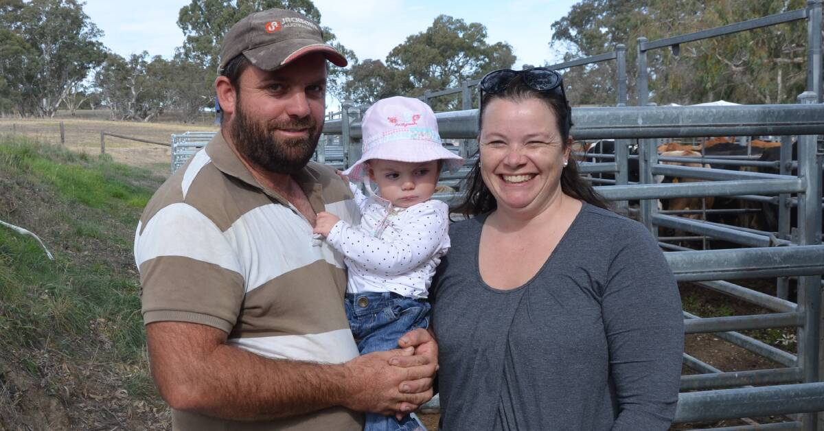 TOP PRICE: Matthew and Claire Pym, Rockleigh, with daughter Charlotte, sold the top price steer at the Mount Pleasant market on Thursday last week.
