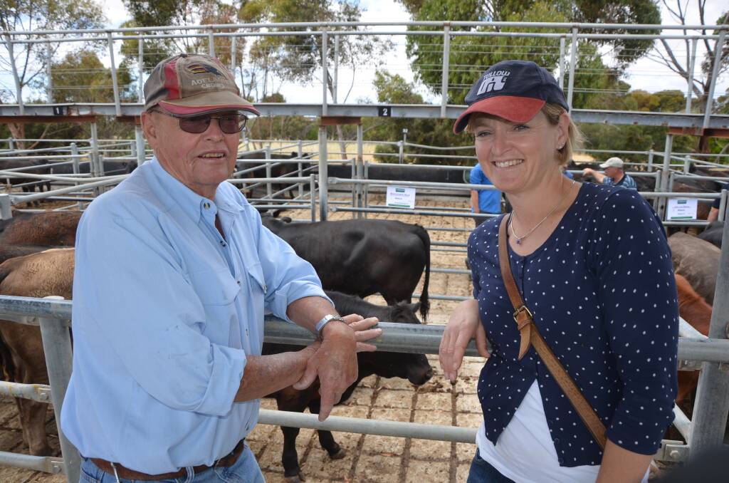 AUCTION RETURN: Andrew McTaggart, Adelaide, and Catriona King, Hahndorf, having a peruse at Strathalbyn on Friday.