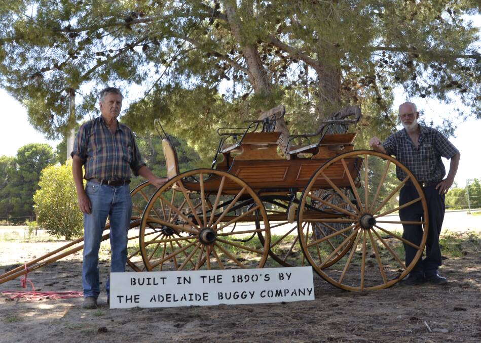 HISTORIC DISPLAY: The Milang Vintage Machinery Club committee president Roger Miller (right) with former president Allan McInnes.
