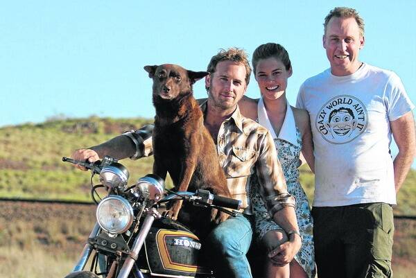 KOKO ACTION: Red Dog producer Nelson Woss (right) with Koko the kelpie and cast members Josh Lucas and Rachael Taylor.