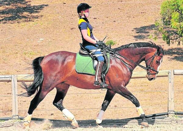 WORKING OUT: Grace Bowman in training with her horse, Kirby Park Joy, in Hahndorf.