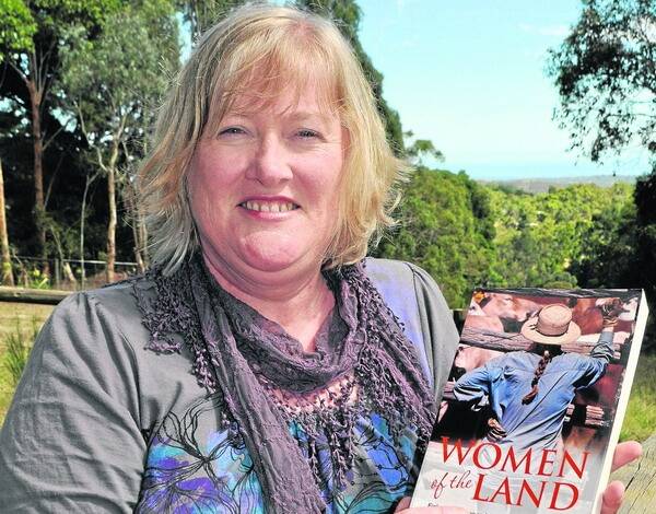 MALE FOCUS: Liz Harfull with her new book Women of the Land which brings together heart-warming stories of eight rural women across Australia who run their own farms.