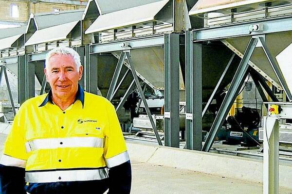 Jim Clark, National Operations Manager for Superfert Dongbu, in front of the new Port Adelaide facility that is the same as the Portland facility that is also completed