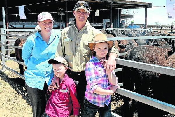 FAMILY AFFAIR: Guest vendors Marnie and Russell Kamp and children Max and Charlie, RMK Pastoral, Willalooka, sold 234 Angus steers to $725 averaging $672.39, at the Amherst, Wittalocka and Moville sales at Willalooka last Friday.