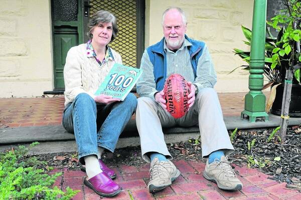 LABOUR OF LOVE: Ian and Wendy Turner, along with a band of helpers, have been working on the Wisanger Football Club Centenary book for the past two years.