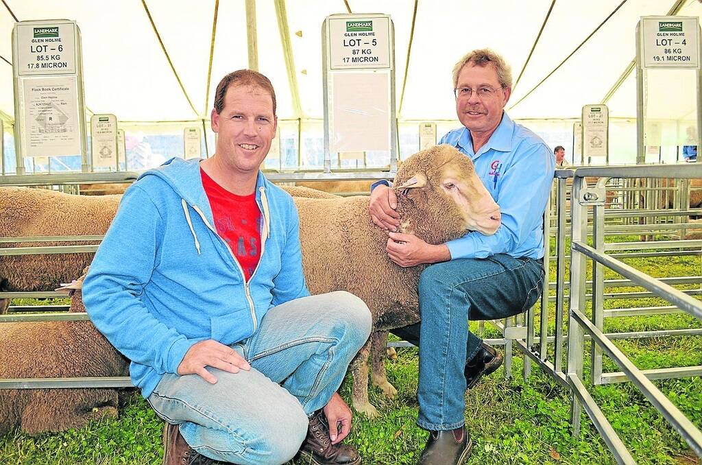 DOHNE TOP: The $3300 top-price Glen Holme ram was bought by Nathan Grosser, Bordertown, pictured with Glen Holme's Allen Kelly, Manoora.