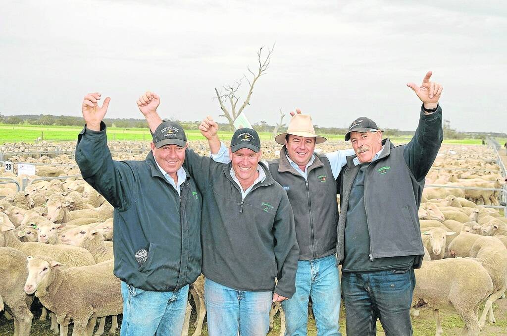 RIGHT DIRECTION: Four of the five Spence Dix &amp; Co directors  Rodney Dix, Glen Hamlyn, Johnno Spence and Robin Steen  display their pleasure with the first sale in the company s new saleyards at Keith. The remaining director, Michael Palm, was unable to be present.