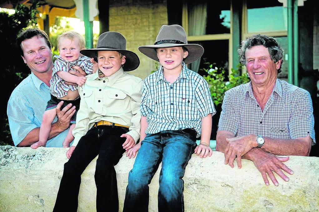 Jason Wheaton at the Stranraer homestead verandah with sons Archie, Tom and Jack, and his father Graham.