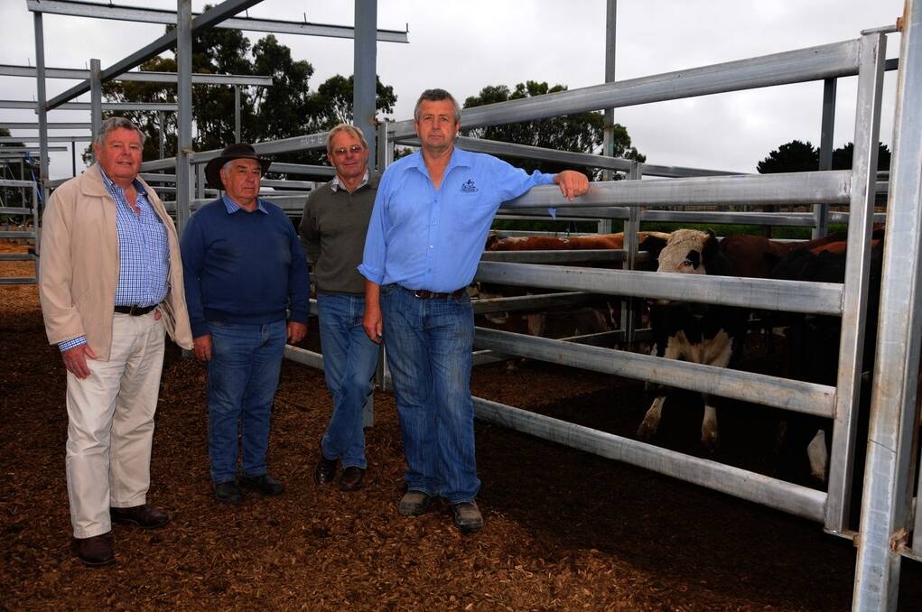 PRIME PALS: Neil Trott, Echunga; Terry Sweetman, Hindmarsh Valley; Paul Price, Inman Valley and Pro Stock Livestock's Kym Endersby at last Wednesday's Mount Compass prime sale.