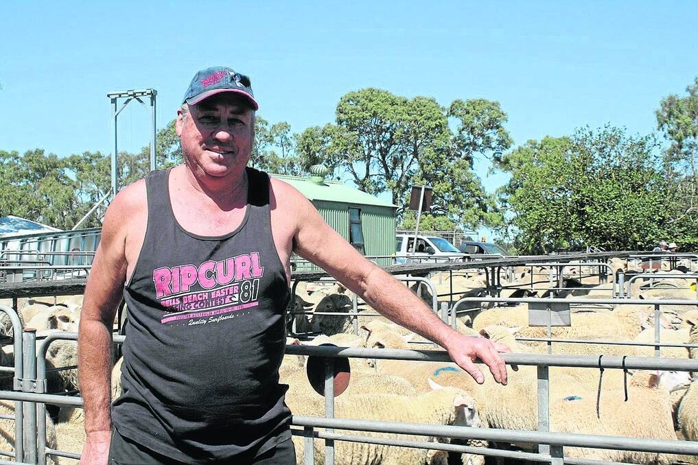 LAMB QUEST: Willunga Quality Meats’ Richard Brown looks for a few lambs at Mount Pleasant sheep and lamb sale.