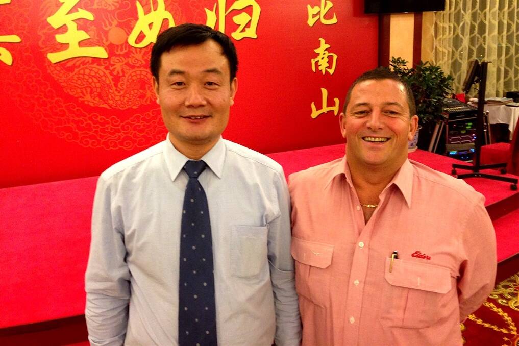 Wool consultant Andrew Dennis, pictured at right with Nanshan Wool Fabric general manager Pan Feng during the recent Elders China Wool Tour, says the long-term outlook for wool is "fantastic".